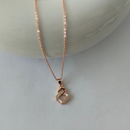 Rose Gold Geometric Pendant Necklace with Diamond Accents