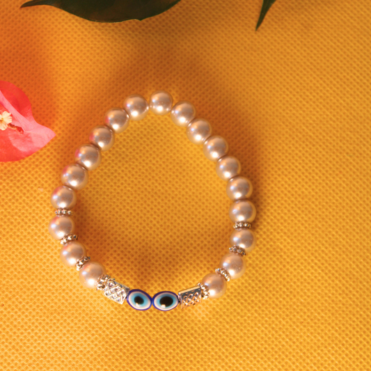 Pearl Bracelet with Evil Eye Charm - Elegant Handmade Jewelry for Protection